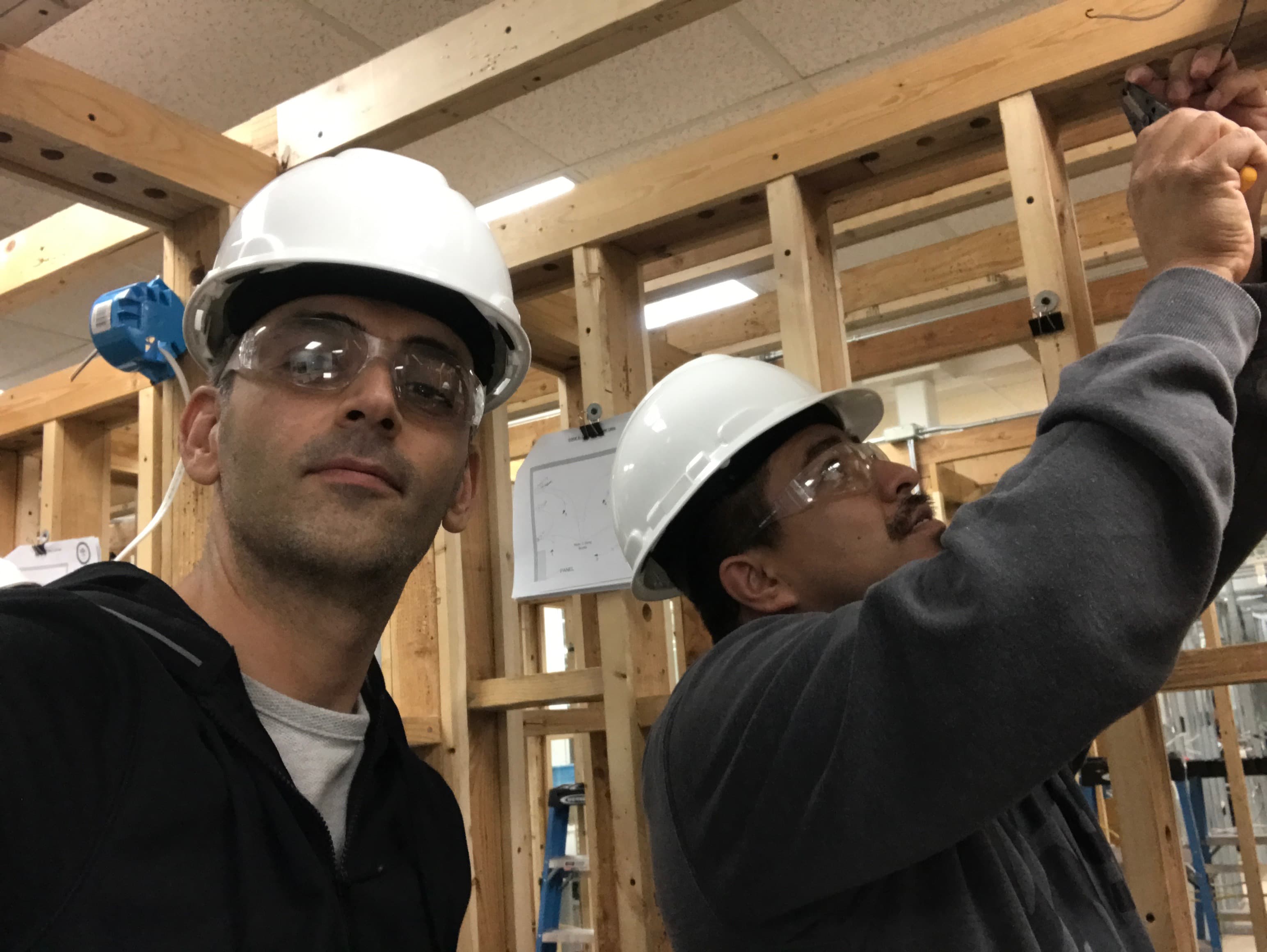 Arya Electric LLC team at work - professional electricians on site